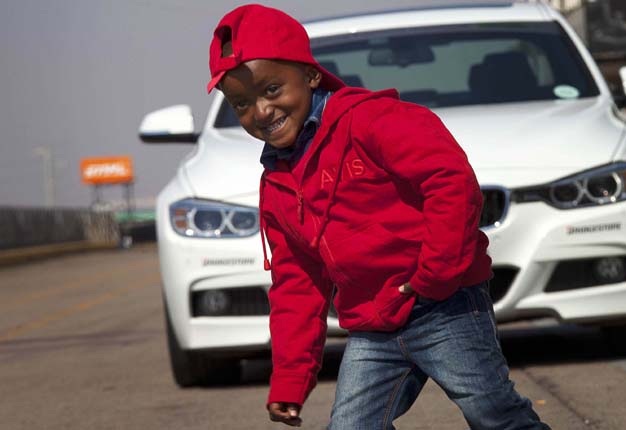 <b>WHAT DREAMS ARE MADE OF:</b> The Reach for a Dream foundation made Lesedi Maphutha's (4) dreams come true at the Zwartkops racetrack with BMW. <i>Image: Thys Dullaart</i>
