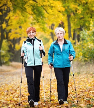 Mother and daughter train nordic walking from Shutterstock