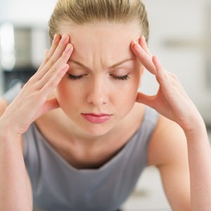 A stressed out woman from Shutterstock.