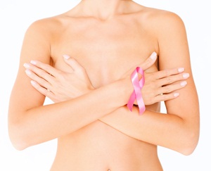 naked woman with breast cancer awareness ribbon from Shutterstock
