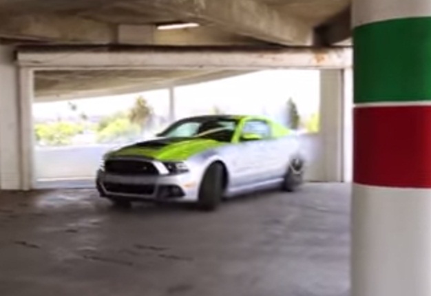 <b>WOULD YOU LET A VALET DO THIS TO YOUR CAR?</b> Professional drifter Justin Pawlak performs awesome slide-ways action behind the wheel of a modified Ford Mustang . <i>Image: YOUTUBE</i>