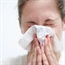 How does the flu virus spread?