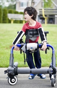 Boy with cerebral palsy from Shutterstock