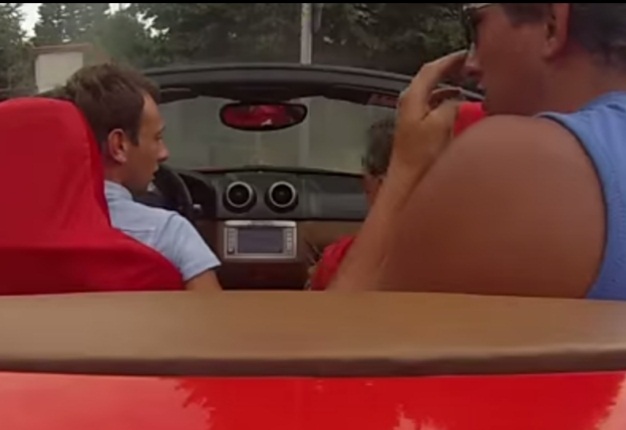 <b> ADVANCED DRIVER TRAINING NEEDED:</b> A driver (left) will have some explaining to do after he crashed a Ferrari California during a test drive. <i>Image: YOUTUBE</i>