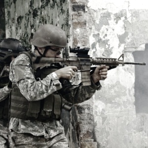 Shutterstock: Soldier with gun