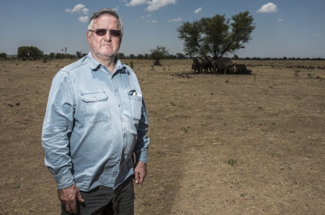 After 30 years of keeping rhinos safe breeder John Hume must sell