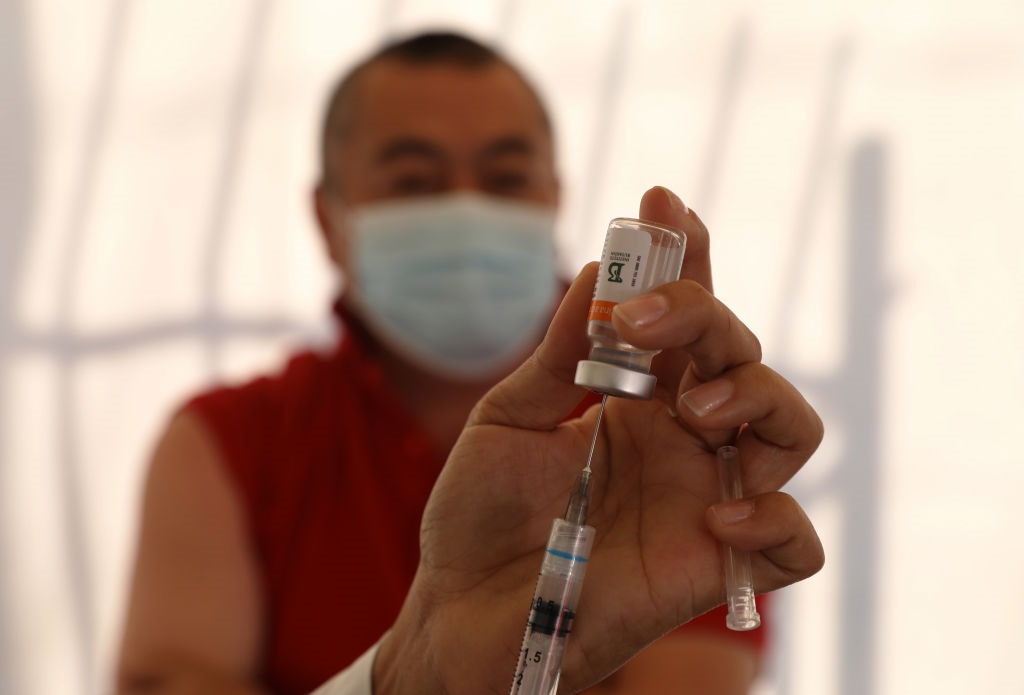 A health worker prepares a CoronaVac vaccine against during an immunisation campaign in Sao Paulo, Brazil. 