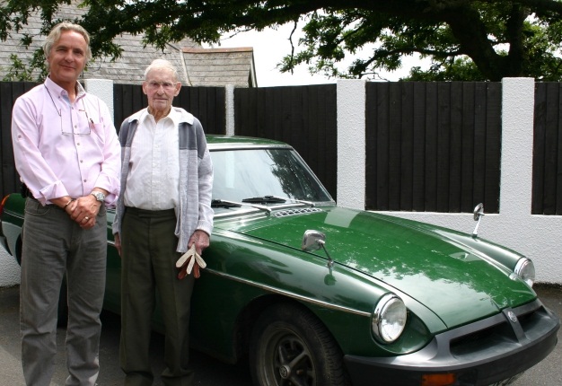 <b>NO SIGN OF SLOWING DOWN:</b> Ron Easton, 98, (right) with Footman James’ business development executive Martyn Raybould after being presented with his special driving gloves. <i>Image: Newspress</i> 