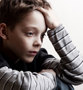 Depressed boy from Shutterstock