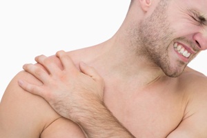 Man with shoulder pain from Shutterstock