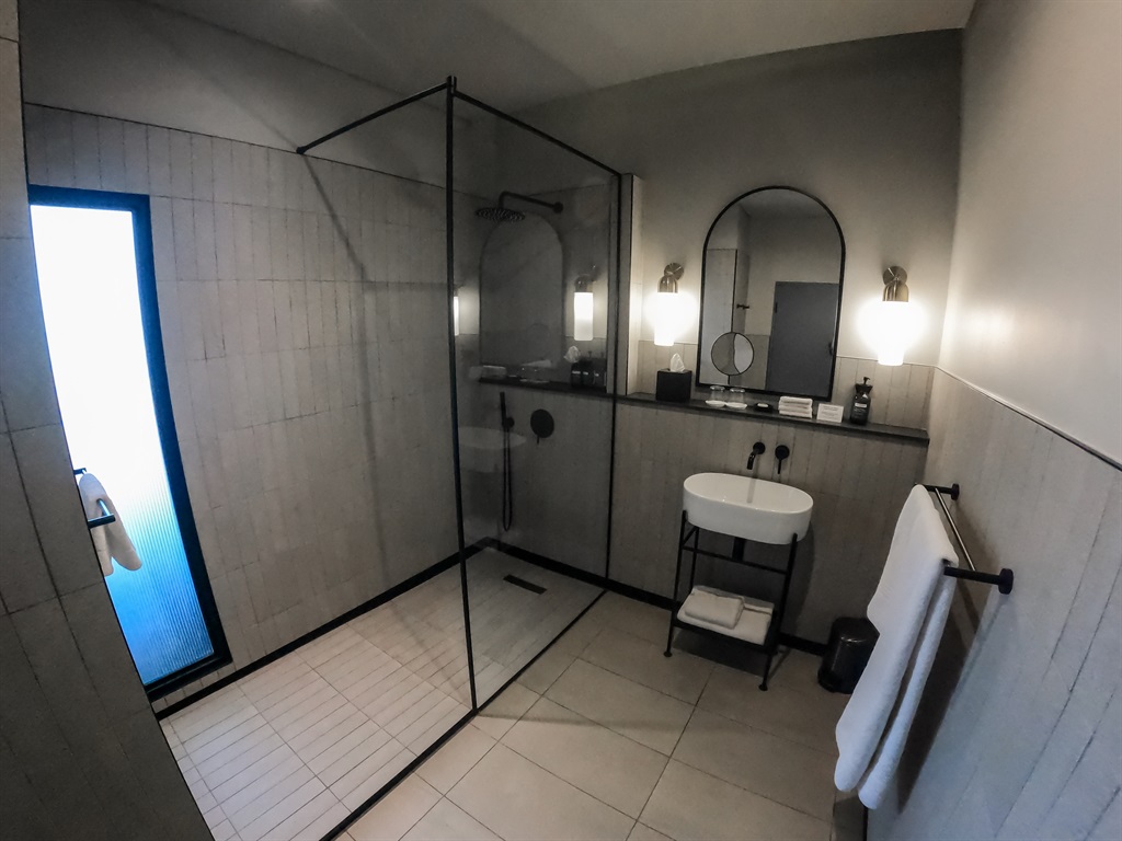 Bathrooms feature walk-in showers and high-end fit