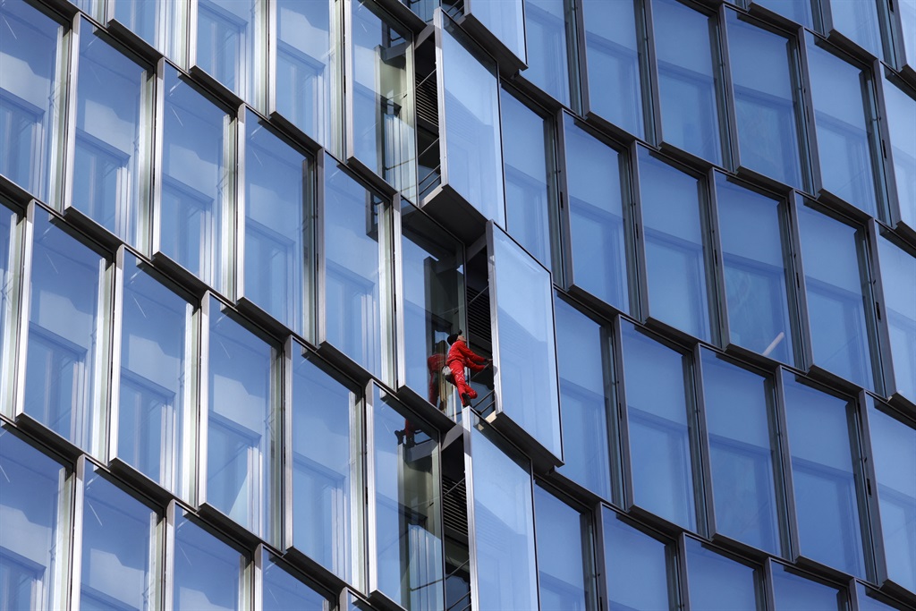 French high level climber Alain Robert popularly known as the "French Spiderman" climbs the Alto Tower, in La Defense near Paris, on April 19, 2023.
