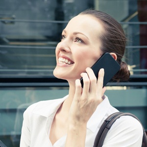 Young woman talking on cellphone from Shutterstock