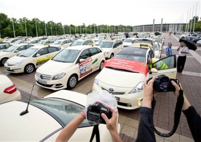 <b>GERMAN TAXI DRIVERS RALLY:</b> German taxi drivers protested against Uber in 2014. In March 2015, Frankfurt  authorities banned the lift-sharing service. <i>Image: AP / Joerg Carstensen</i>