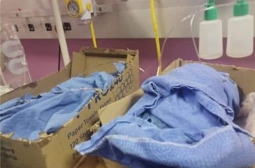 Newborn babies were put into cardboard boxes just after birth. 