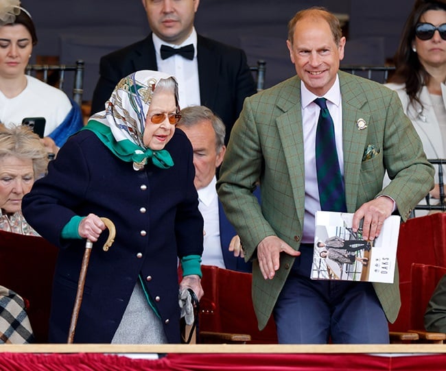 Queen Elizabeth II, accompanied by Prince Edward, 
