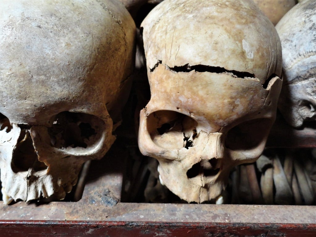 The churches of Nyamata and Nyarubuye in Rwanda showing the clothes and skulls of the victims that died in the genocide. 