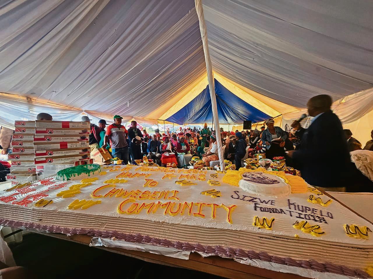A giant cake was one of the treats during a Christmas lunch hosted by the Sizwe Kupelo Foundation for the community of Chwebeni in Port St Johns.
