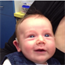 7 week old baby smiles as he hears for the first time