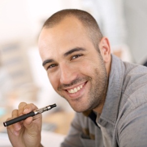 Man with e-cigarette from Shutterstock