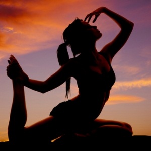 Woman in a yoga pose from Shutterstock