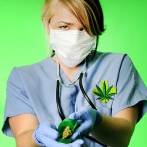 Healthcare professional with marijuana from Shutterstock