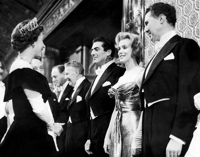 Marilyn Monroe meets Queen Elizabeth II at the Roy