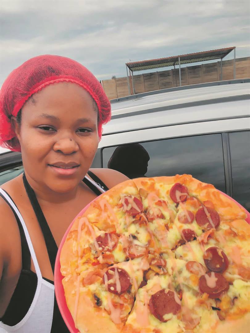 Naledi Dhlomo now serves pizza in her bakery. 