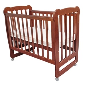 Empty baby cot from Shutterstock