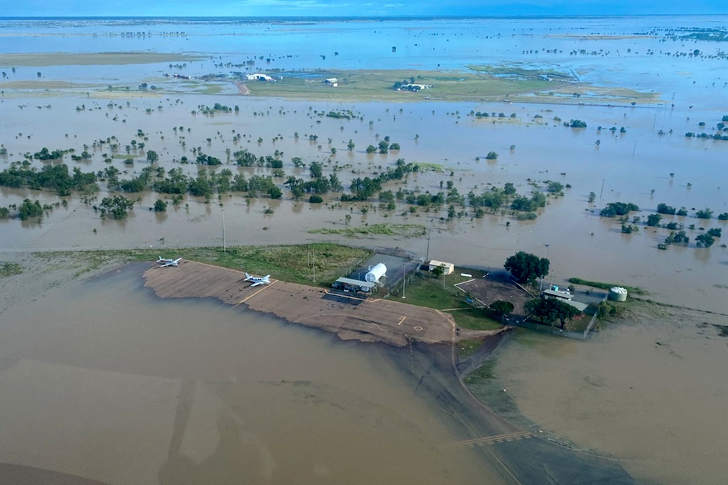 This handout photo taken on March 10, 2023 and received on March 11, 2023 from the Queensland Police Service shows an aerial view of the flooded northern Queensland town of Burketown. 