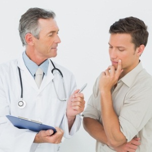 Doctor talking to patient from Shutterstock
