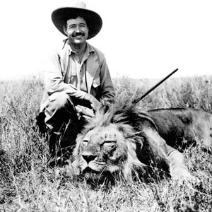Ernest Hemingway on safari, 1934. Ernest Hemingway Photograph Collection, JFK Presidential Library and Museum, Boston. Public Domain via Wikimedia Commons. Sport hunting in the 19th & 20th centuries caused massive declines in the lion populations 