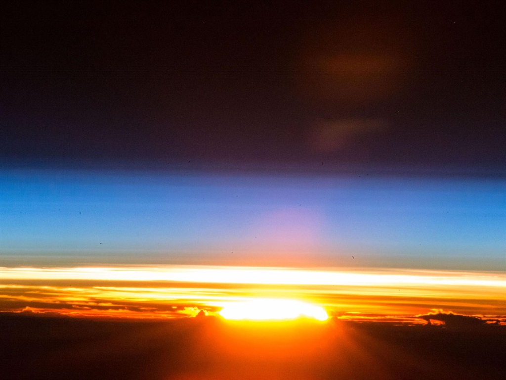A sunrise is photographed from the International Space Station, December 25, 2017.