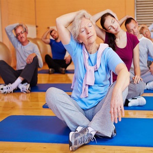 Senior yoga class at a fitness centre.