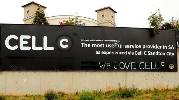 The banner, which displayed a customer's anger at Cell C, now reads "The most useful service provider in SA - Cell C Sandton City". (Werner Beukes, Sapa)