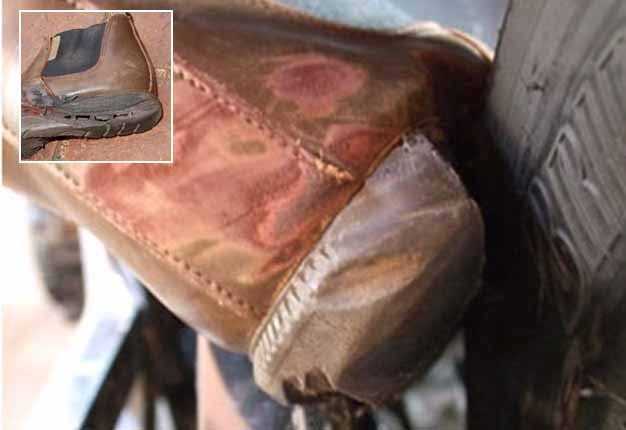 LUCKY ESCAPE: Make sure you and your children know pillion safety tips when riding, This scuffed boot shows when an incident could have ended badly. Image: Arrive Alive