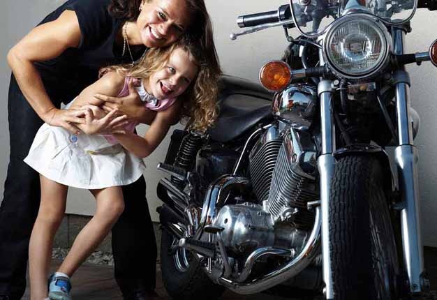 <B>SAFETY FIRST:</B> Make sure you and your children know pillion safety rules when riding. It could just save a life. <I>Image:</I>