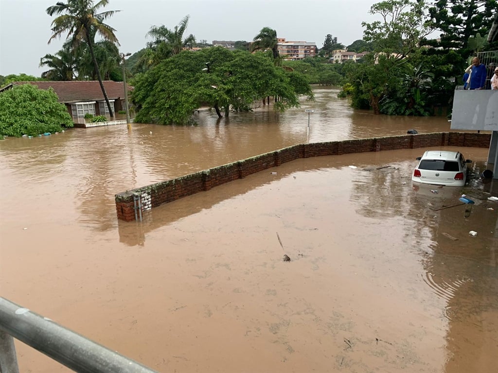 A car stranded in deep water at Isipingo.