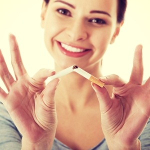 Young woman quitting smoking