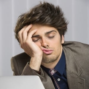 Tired businessman from Shutterstock