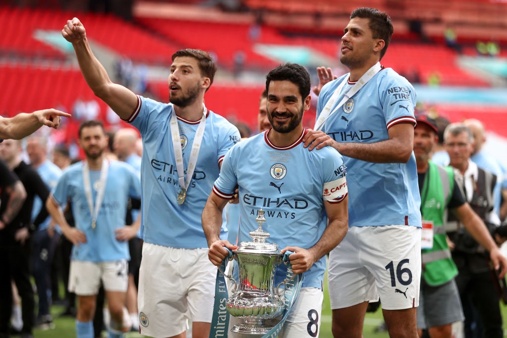 LONDON, ENGLAND - JUNE 3: Ilkay Gundogan of Manchester City celebrates with the FA Cup Trophy after the 2-1 victory during the  Emirates FA Cup Final match between Manchester City and Manchester United at Wembley Stadium on June 03, 2023 in London, England. (Photo by James Williamson - AMA/Getty Images)