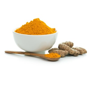 Bowl of turmeric powder with fresh turmeric root from Shutterstock