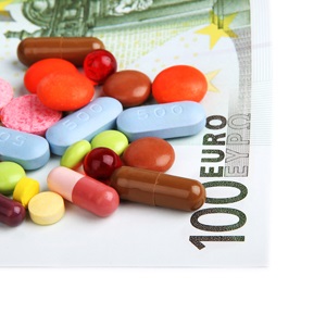 pills and 100 euro from Shutterstock