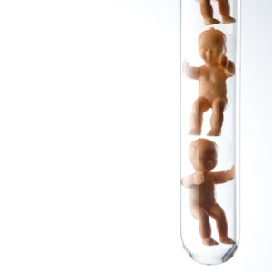 Plastic babies in a test tube from Shutterstock
