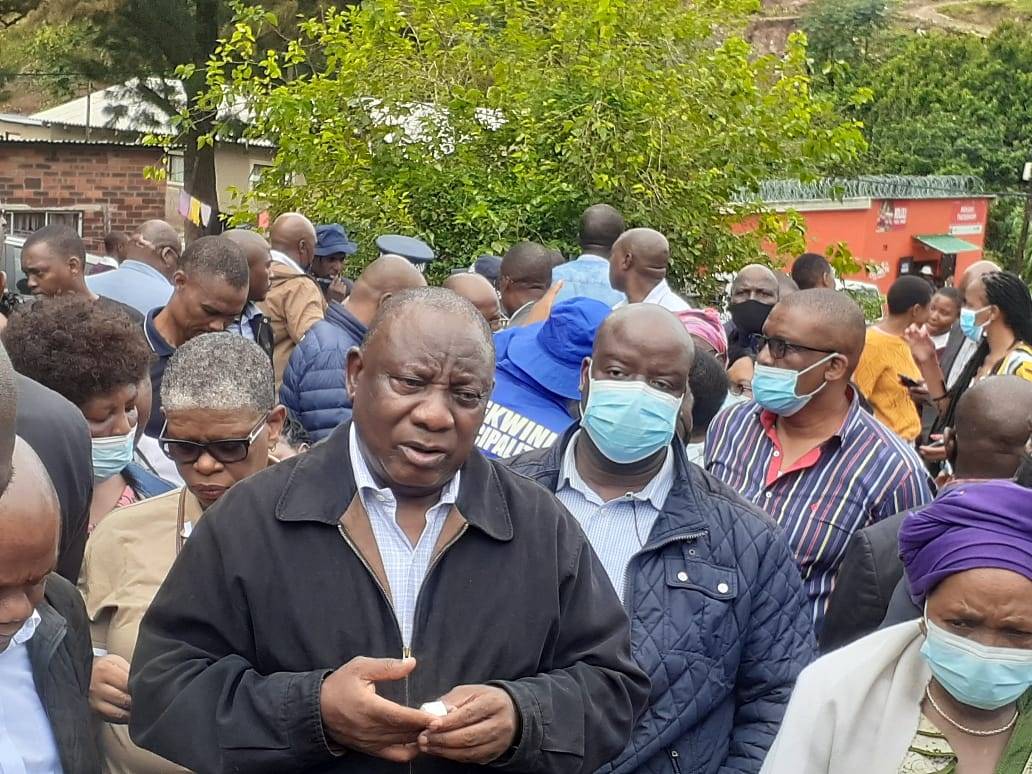 President Cyril Ramaphosa accompanied by Zandile Gumede MPL, speaking to a family in Clermont where four people died.PHOTO: Thabiso goba 