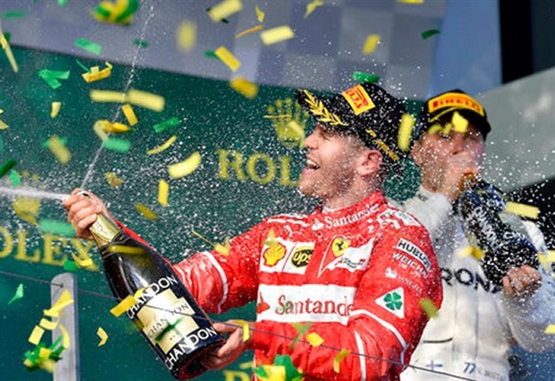 Sebastian Vettel out-manoeuvred Lewis Hamilton and the world champion Mercedes team with a stunning victory in the season-opening Australian Formula One Grand Prix in Melbourne on Sunday.
