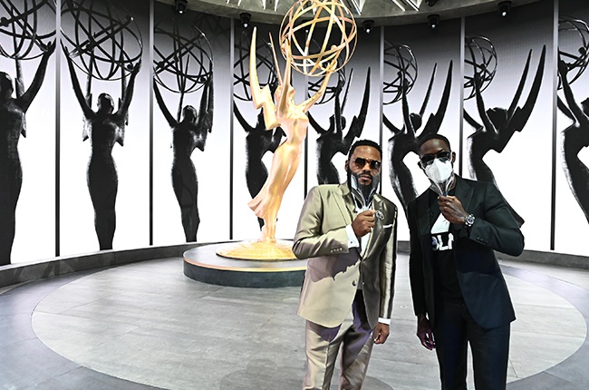 Anthony Anderson (L) and Sterling K. Brown (R) hol