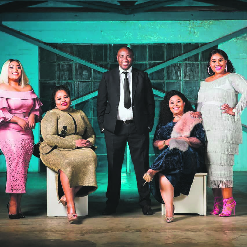 Polygamist Musa Mseleku flanked by his four wives, from left: MaKhumalo, MaCele, MaYeni and MaNgwabe.