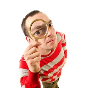 Parent with magnifying glass from Shutterstock