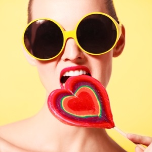 Woman with lollipop from Shutterstock